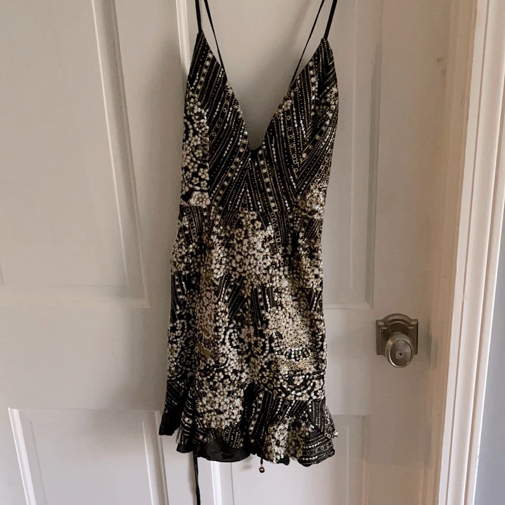 Black and beaded deep v ruffle skirt mini dress